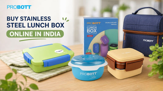 Probott stainless steel lunch boxes in multiple sizes and designs displayed on a wooden table, showcasing leak-proof, BPA-free tiffin boxes available to buy online in India.
